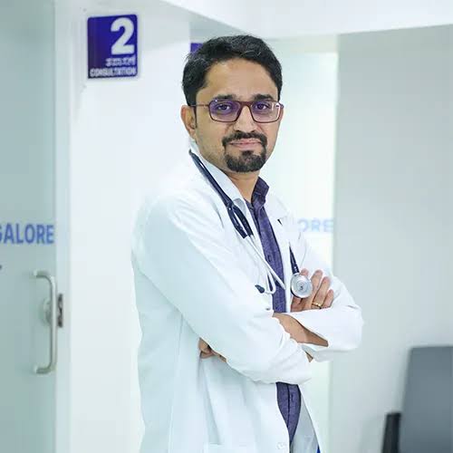 Dr Kiran B J